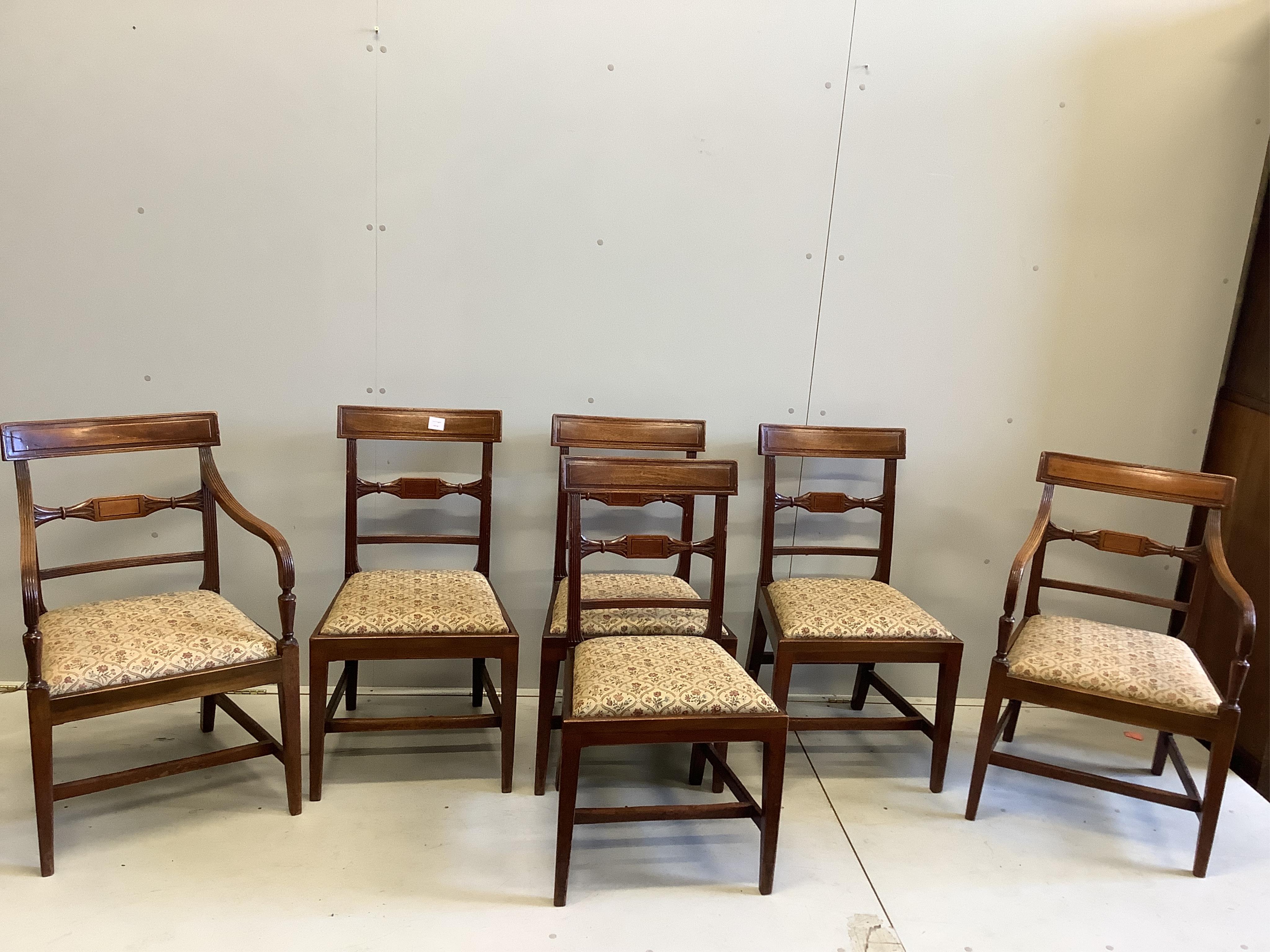 A set of six George III provincial mahogany dining chairs, two with arms, height 88cm. Condition - fair